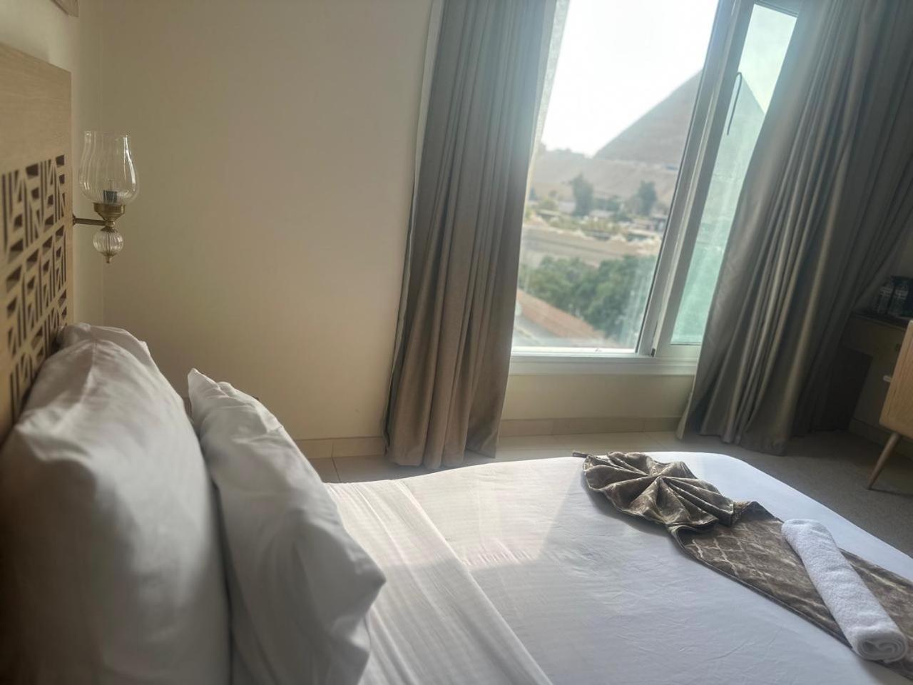 Doudou Pyramids View Hotel Kafret el-Gabal Eksteriør billede
