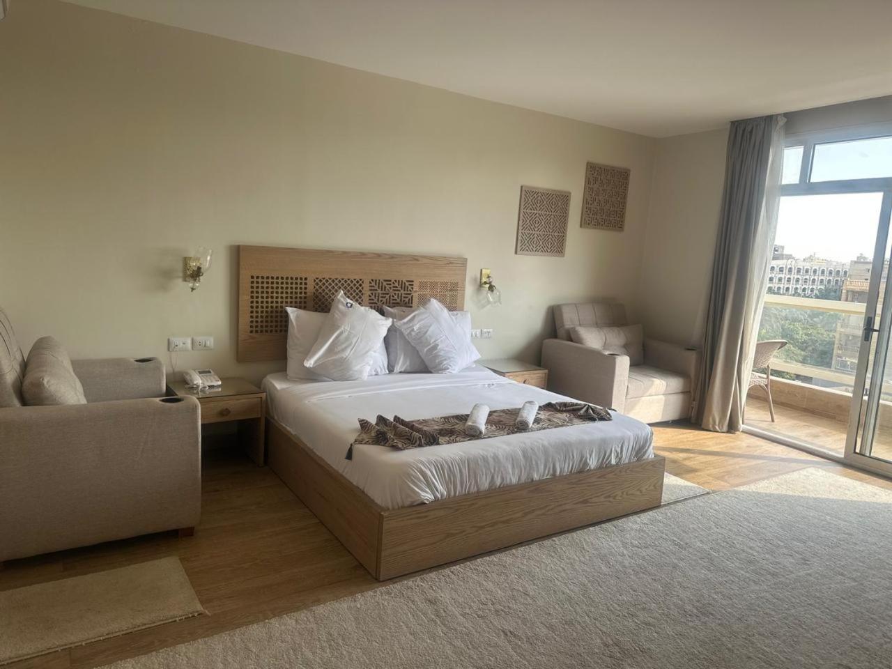 Doudou Pyramids View Hotel Kafret el-Gabal Eksteriør billede